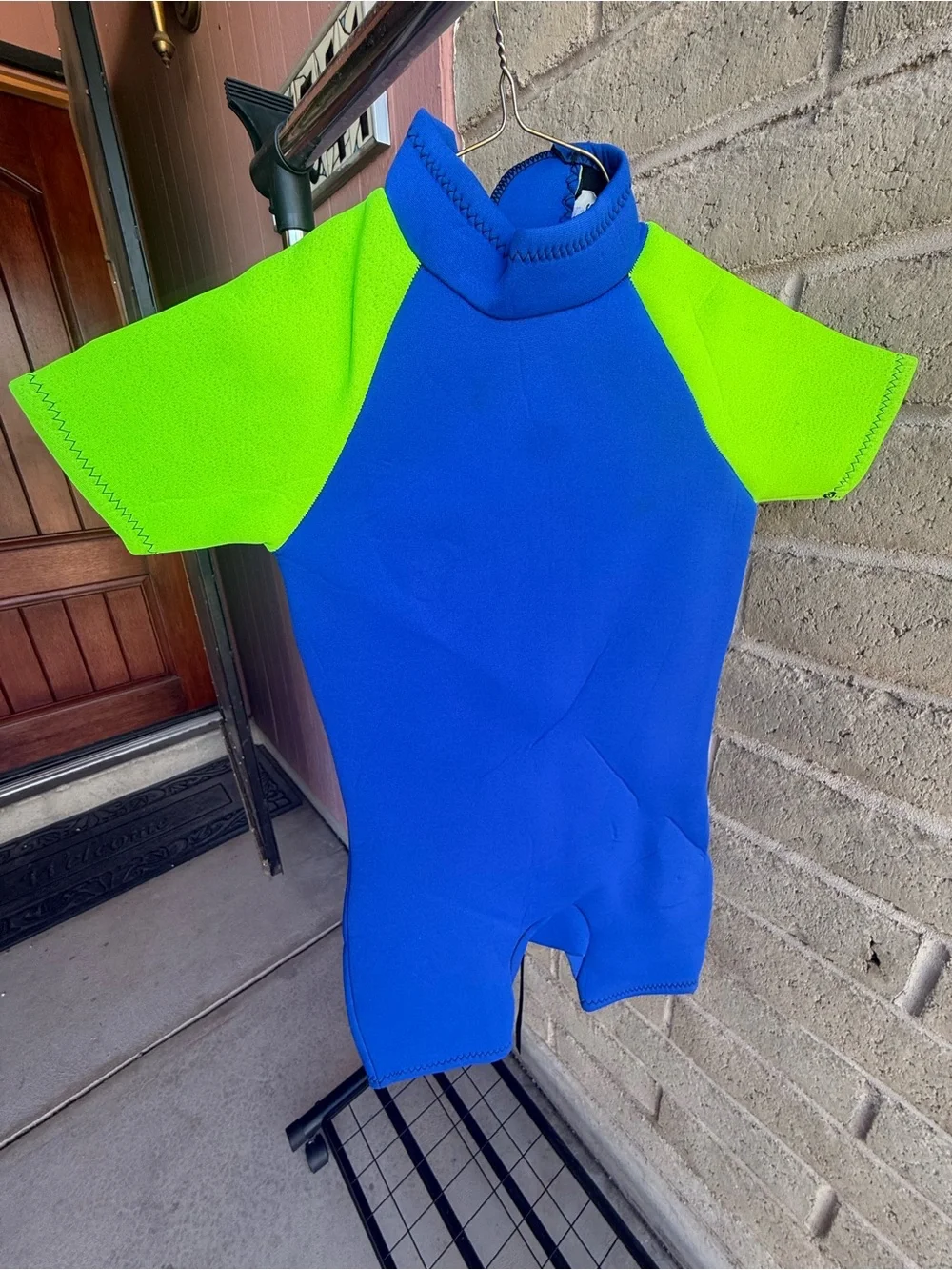 Blue and Neon Green Shorty Wetsuit